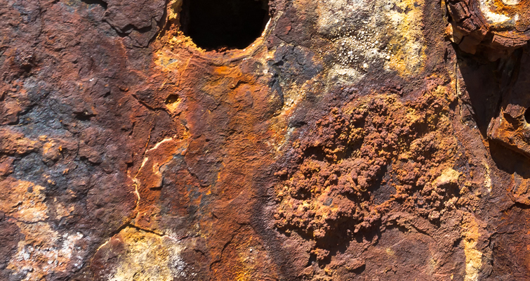 Close-up image of rust formation on a ship wreckage.