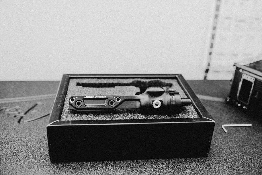 Black and White image of the Outrigger Handle placed on a box